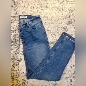 Blue High Rise Jeans with cross zipper detail